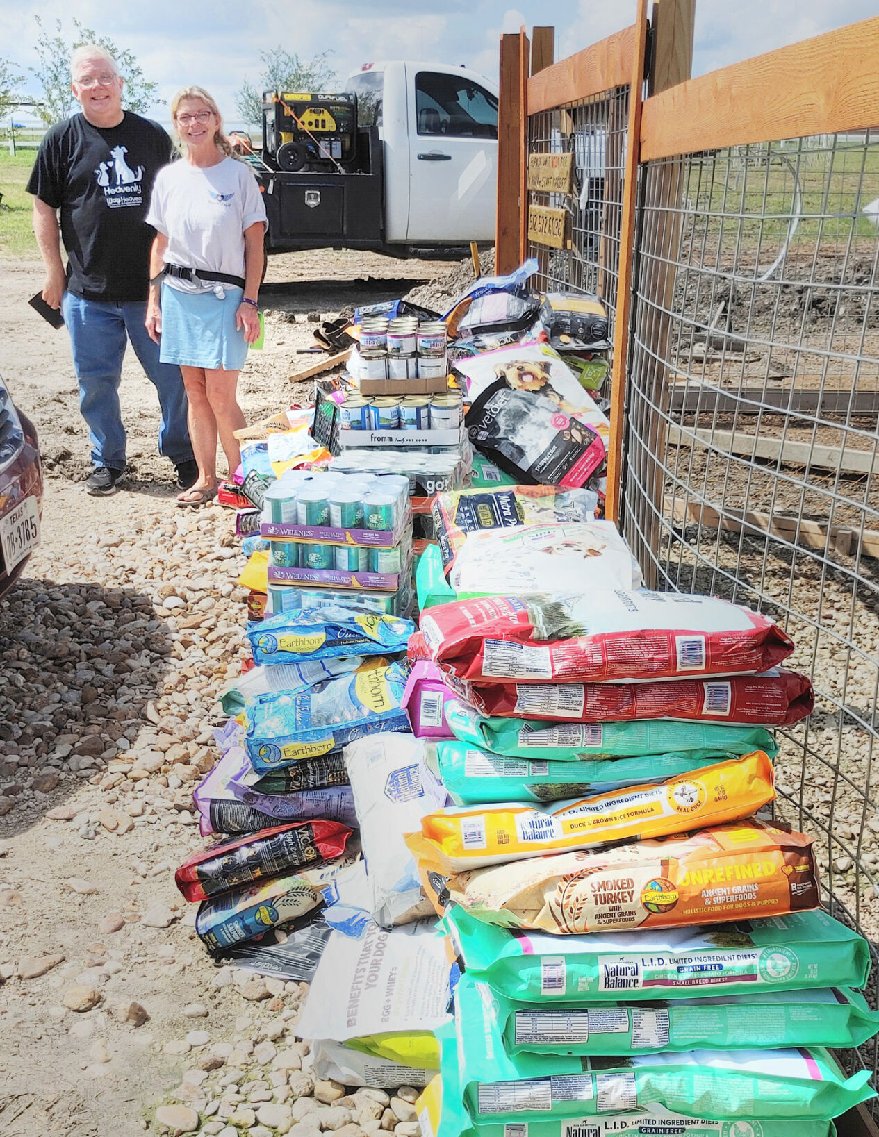 Food Donations - Jeff and Rhonda of Living Grace Canine Ranch.jpg